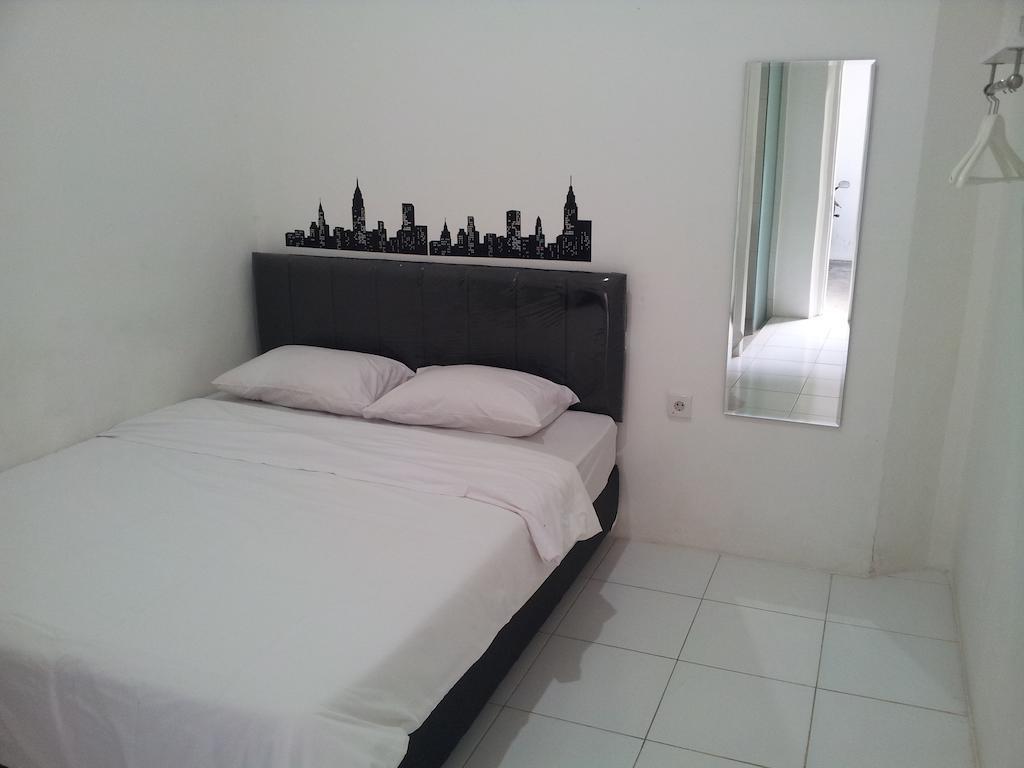 Loxy Inn Surabaya Habitación foto