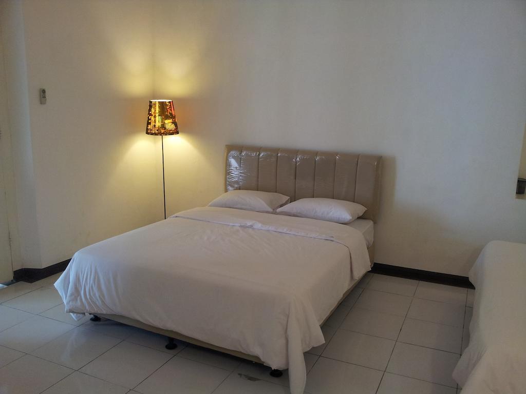 Loxy Inn Surabaya Habitación foto