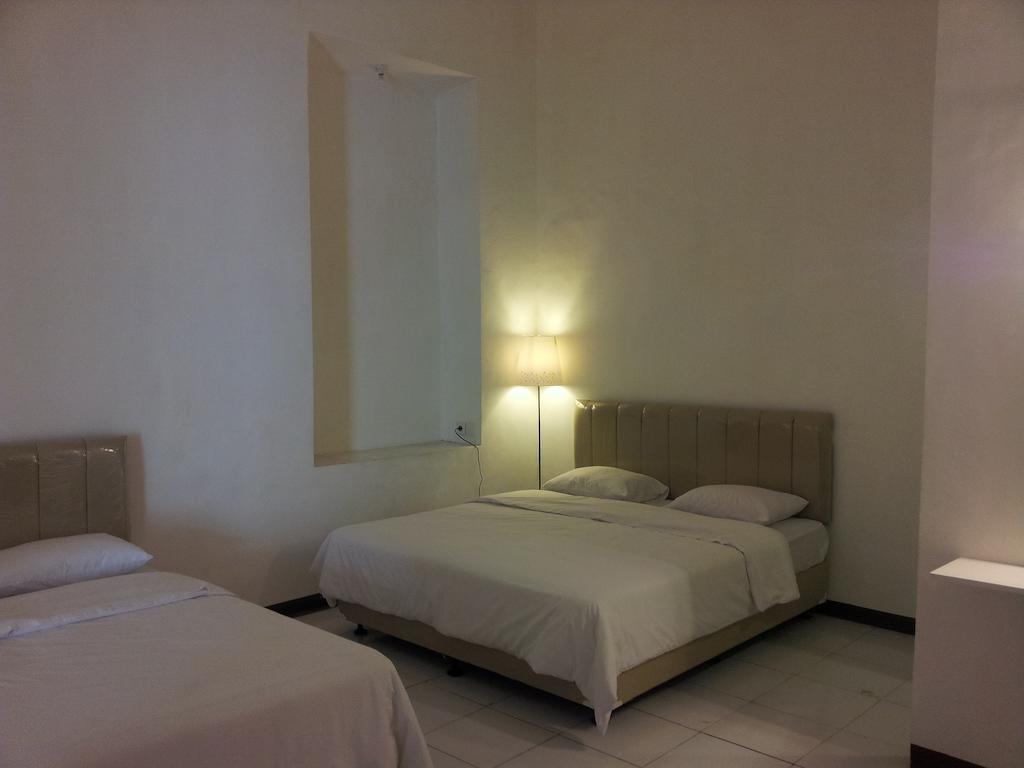 Loxy Inn Surabaya Habitación foto