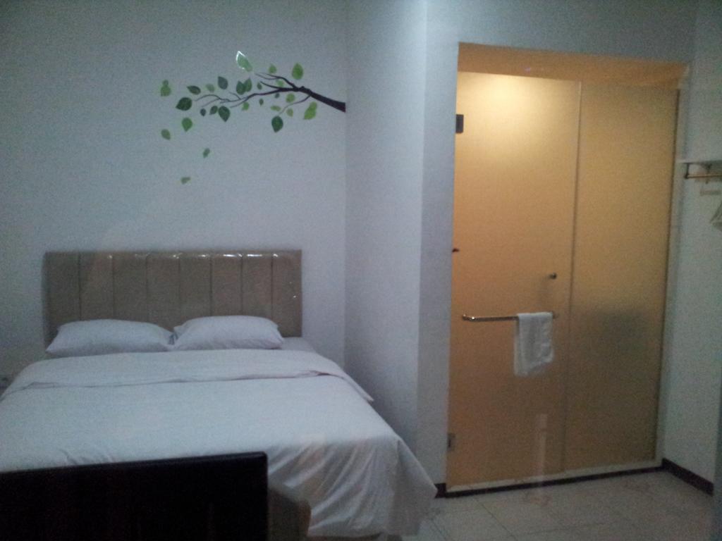 Loxy Inn Surabaya Habitación foto