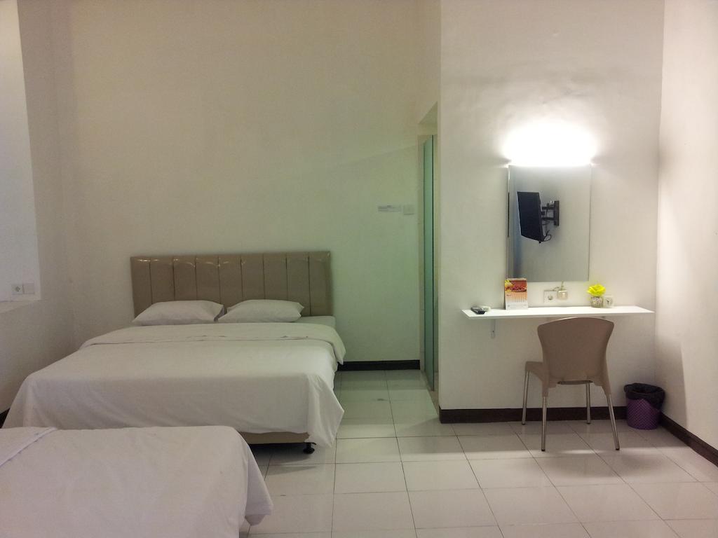 Loxy Inn Surabaya Habitación foto